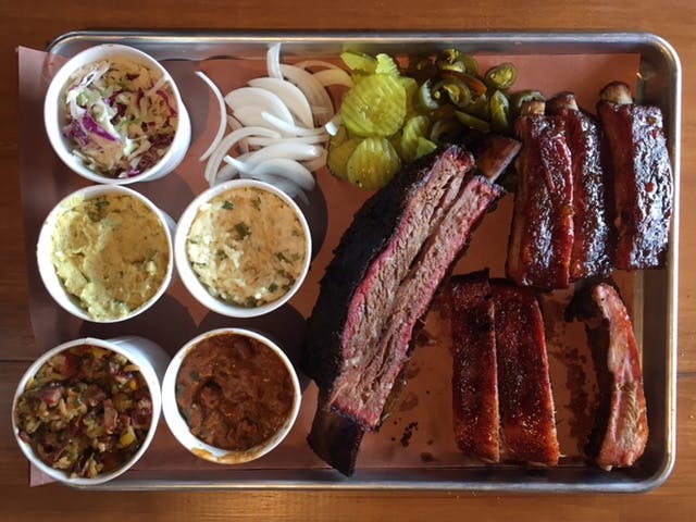 Pinkerton's Barbecue signature dishes Beef Ribs, Dry Rub Pork Ribs, Pulled Pork.